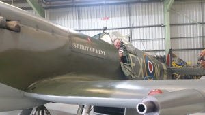 Alan Rooney sitting in a Spitfire